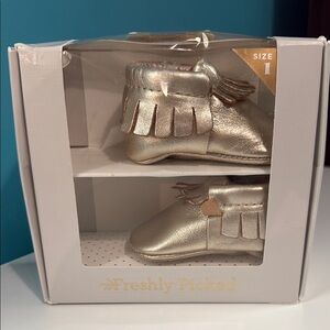 Freshly Picked Platinum Moccasins with Fringe Details